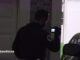 Police take photographs in a garage at the scene of a stabbing on Fawn Lane near Hick Road in Palatine