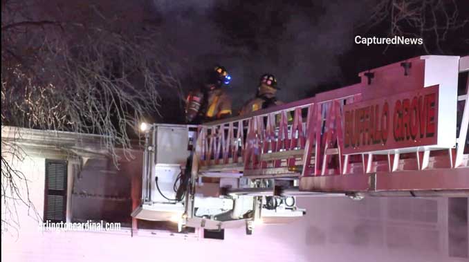 Buffalo Grove Tower Ladder at Side A at a house fire in Arlington Heights Buffalo Grove Tower Ladder at Side A at a house fire in Arlington Heights