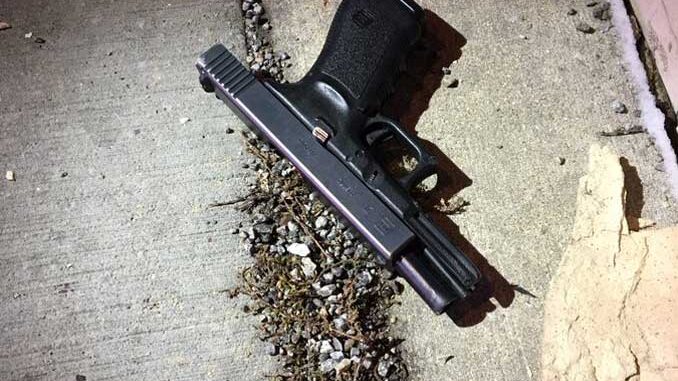 Suspect's handgun recovered in Evanston (SOURCE: Evanston Police Department) Suspect's handgun recovered in Evanston (SOURCE: Evanston Police Department)