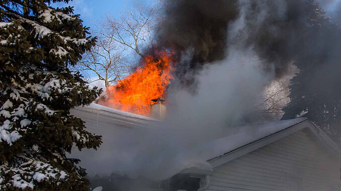 Heavy fire through the roof on Patton Drive in Buffalo Grove (PHOTO CREDIT: J Kleeman)