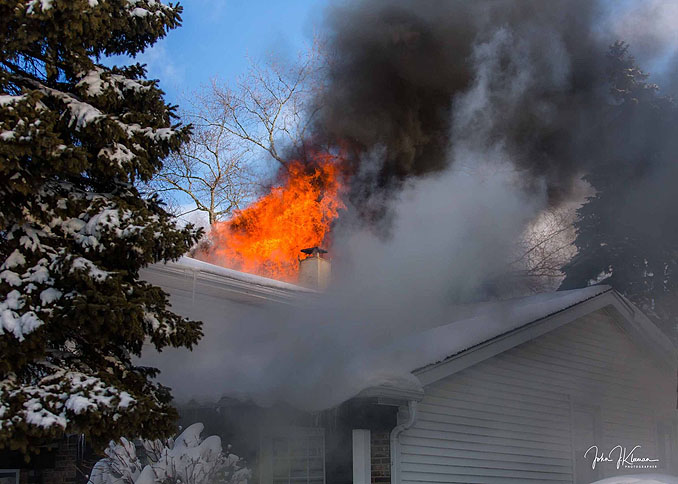 Heavy fire through the roof on Patton Drive in Buffalo Grove (PHOTO CREDIT: J Kleeman)