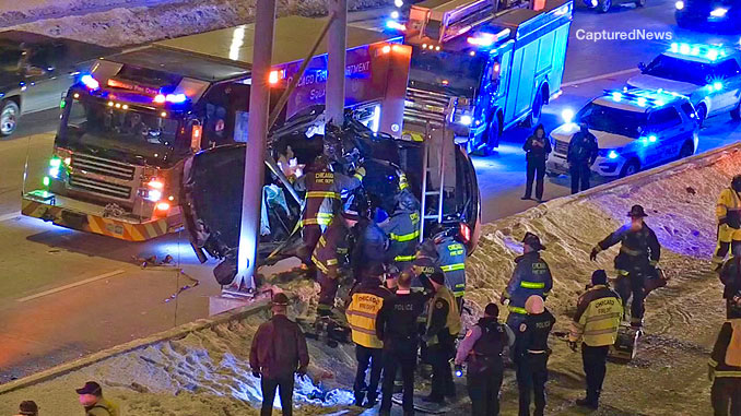 Chicago firefighters working to extricate victims from a Chrysler 300 on the Dan Ryan Expressway Tuesday, February 9, 2021 (CapturedNews)