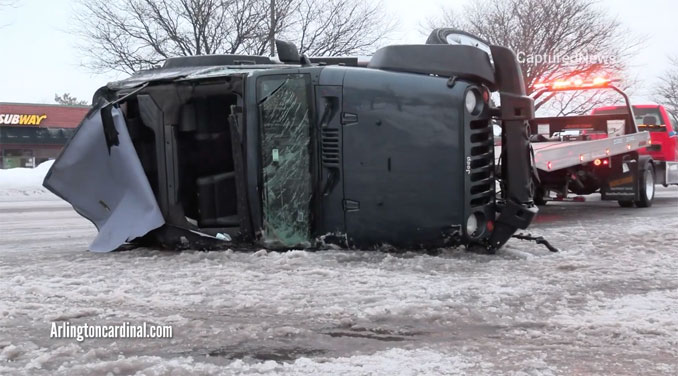 Rollover black Jeep Wrangler after crash with a parkway tree on Rand Road in Arlington Heights