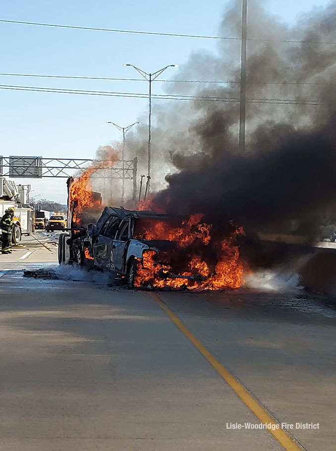 Crash with fire involving a bobtail and a white Ford Expedition on I-88 West near Naperville Road (SOURCE: Lisle-Woodridge Fire District)