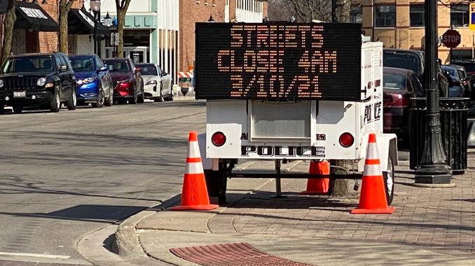 Portable electronic sign board announces Arlington Alfresco street closures at 4 AM Wednesday, March 10, 2021