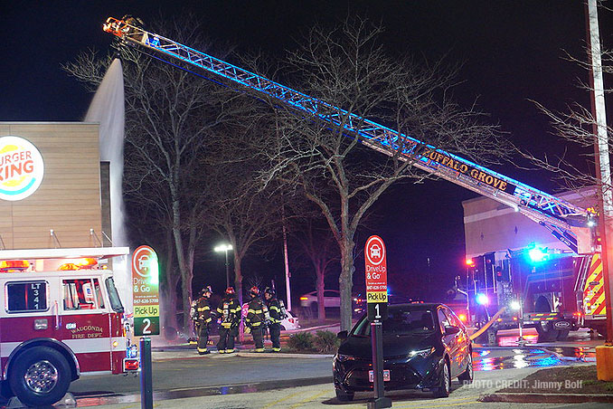 Buffalo Grove crew soaking the roof at extra alarm fire at Burger King on Rand Road in Lake Zurich (PHOTO CREDIT: Jimmy Bolf)