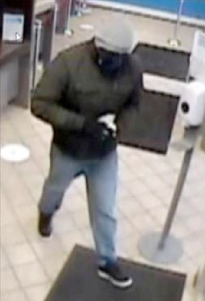 Bank robber at BMO Harris Bank, 9101 Cermak Avenue in Riverside (surveillance video still)