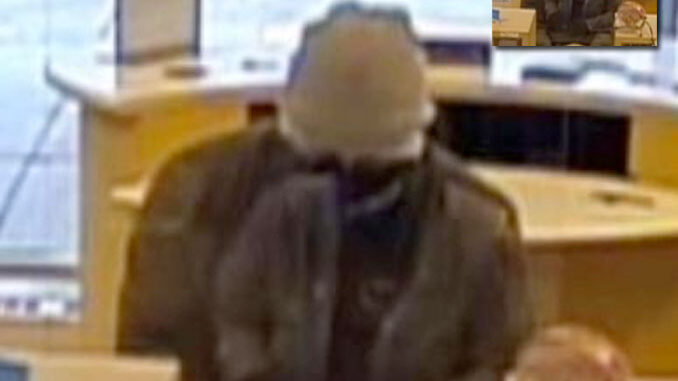 Bank robber at BMO Harris Bank, 9101 Cermak Avenue in Riverside (surveillance video still)