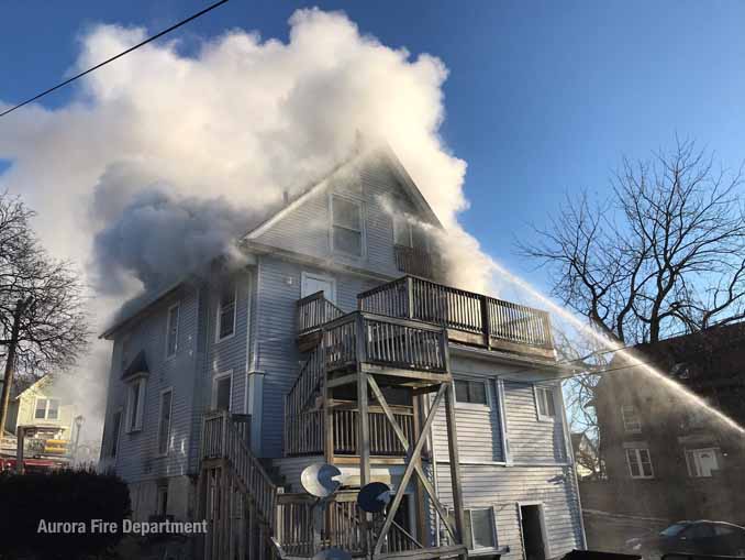 Water stream to an upper floor at the fire on Downer Place Aurora on Tuesday, March 2, 2021 (SOURCE: Aurora Fire Department)