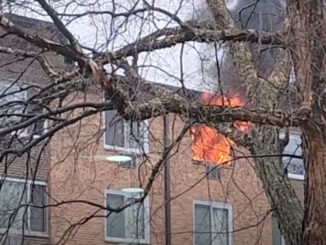 Flames from window of Mallard Cove condo unit at Extra-Alarm Fire on Saturday morning, December 23, 2023 (obtained photo)