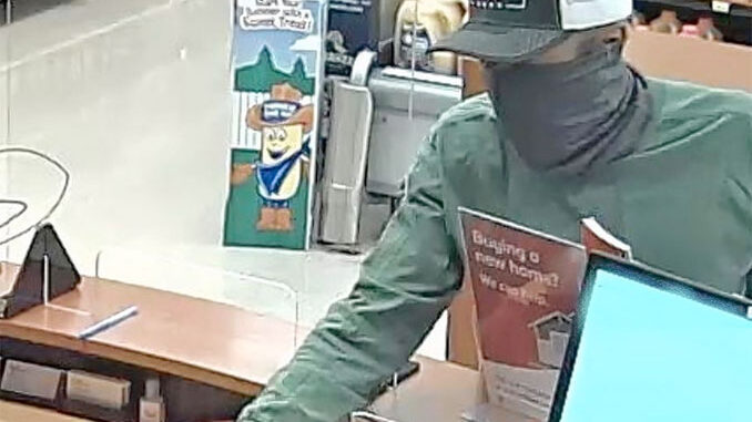 Jewel-Osco TCF Bank security image of bank robber at 1860 South Arlington Heights Road in Arlington Heights (SOURCE: FBI Chicago) Jewel-Osco TCF Bank security image of bank robber at 1860 South Arlington Heights Road in Arlington Heights (SOURCE: FBI Chicago)