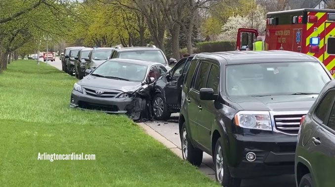 Parked vehicles hit on Oakton Street near Saint Viator in Arlington Heights