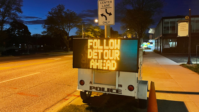 FOLLOW DETOUR AHEAD on electronic trailer sign on northbound Arlington Heights Road just north of Park Street in Arlington Heights, May 11, 2021