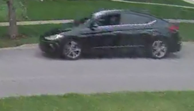 Suspect's black Hyundai Accent Limited, side view while fleeing scene (Security Image)
