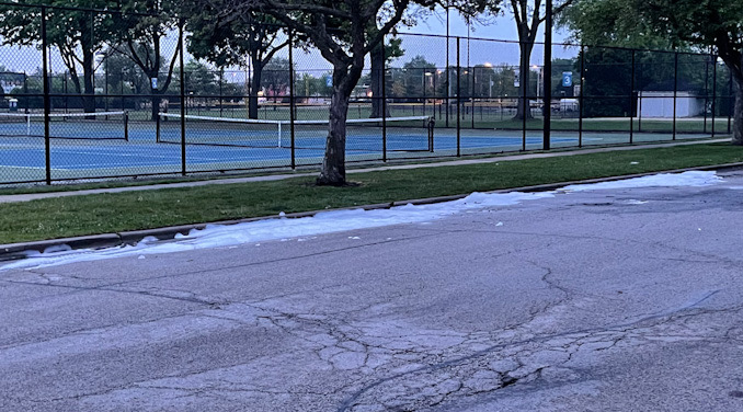 AFFF: Foam near the northbound curb of Belmont Avenue in Arlington Heights on Thursday, May 20, 2021