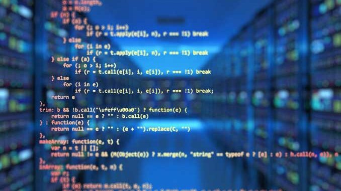 Source code superimposed over a data room or server room at a business. Source code superimposed over a data room or server room at a business.