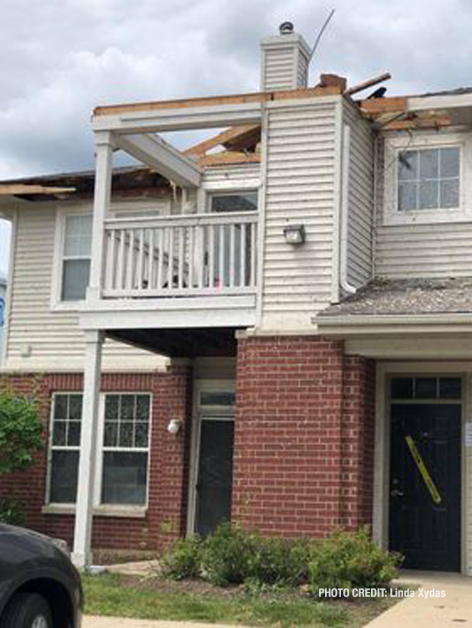 Roof and other damage at The Estates of Thornberry Woods on Gladstone Drive just south of 75th Street near the border of Naperville and Woodridge (PHOTO CREDIT: Linda Xydas)