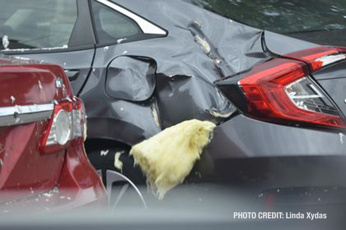 Vehicle damage from a tornado at The Estates of Thornberry Woods on Gladstone Drive just south of 75th Street near the border of Naperville and Woodridge