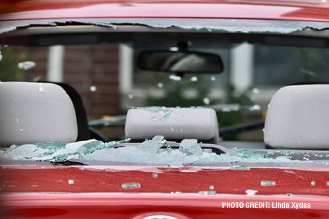 Vehicle damage from a tornado at The Estates of Thornberry Woods on Gladstone Drive just south of 75th Street near the border of Naperville and Woodridge.