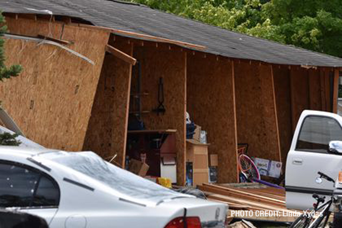 Tornado damage to a storage garage  at The Estates of Thornberry Woods on Gladstone Drive just south of 75th Street near the border of Naperville and Woodridge