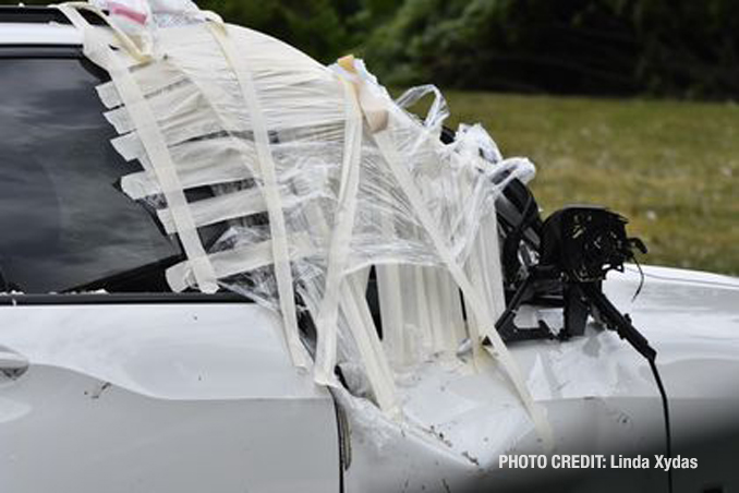 Vehicle damage from a tornado at The Estates of Thornberry Woods on Gladstone Drive just south of 75th Street near the border of Naperville and Woodridge.