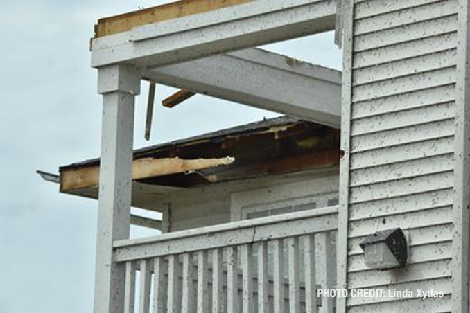 Roof and other damage at The Estates of Thornberry Woods on Gladstone Drive just south of 75th Street near the border of Naperville and Woodridge