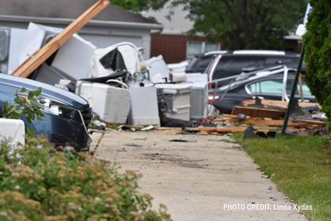 Tornado damage to a storage garage with appliances scattered