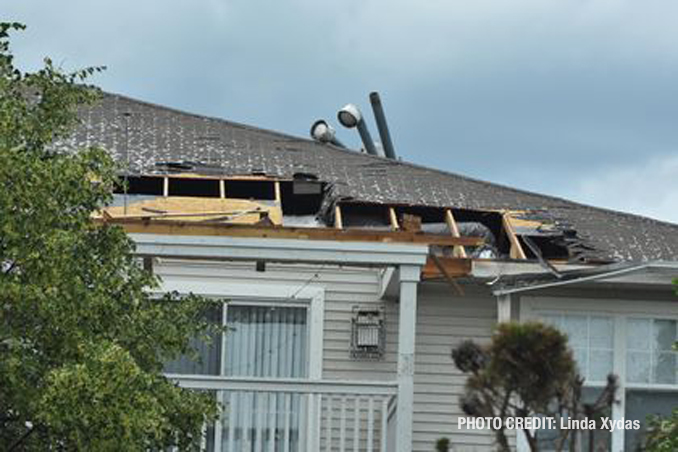 Roof and other damage at The Estates of Thornberry Woods on Gladstone Drive just south of 75th Street near the border of Naperville and Woodridge