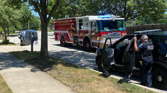 Car vs tree rollover crash on Heritage Drive Mount Prospect