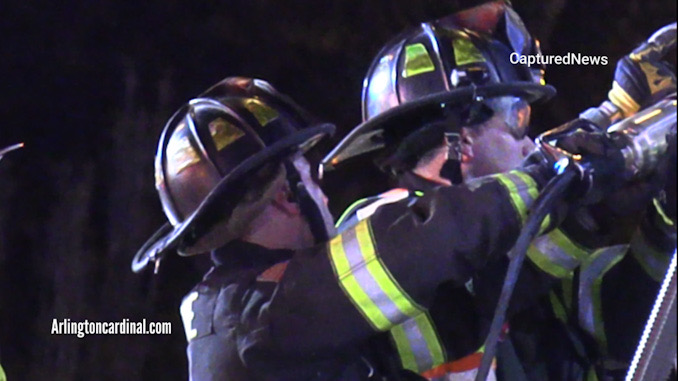 Extrication on the driver's side of a Chevrolet work van with a strut stabilizing the van