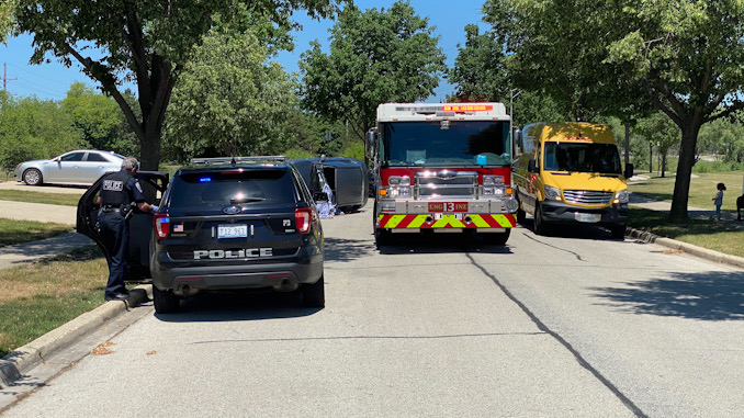 Car vs tree rollover crash on Heritage Drive Mount Prospect