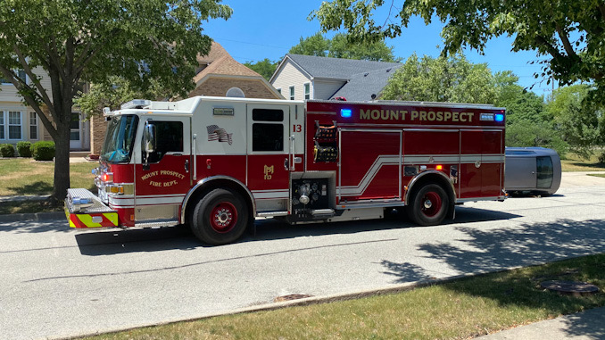 Car vs tree rollover crash on Heritage Drive Mount Prospect