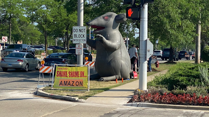 Labor Dispute: Shame, Shame on Amazon sign at Town & Country Shopping Center entrance