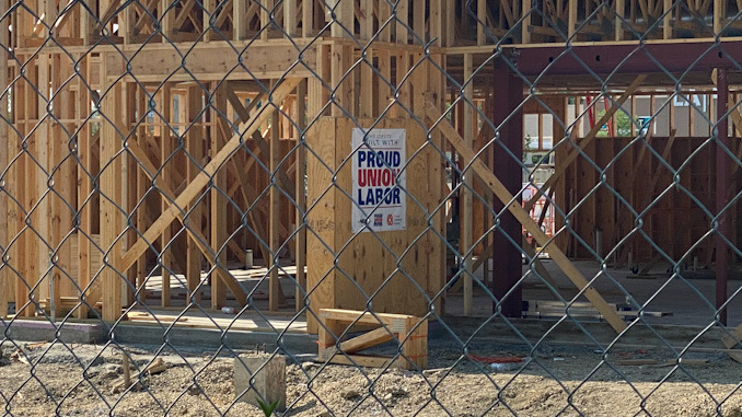 The labor dispute does not involve the Raising Cane's construction site at the outlot near Palatine Road