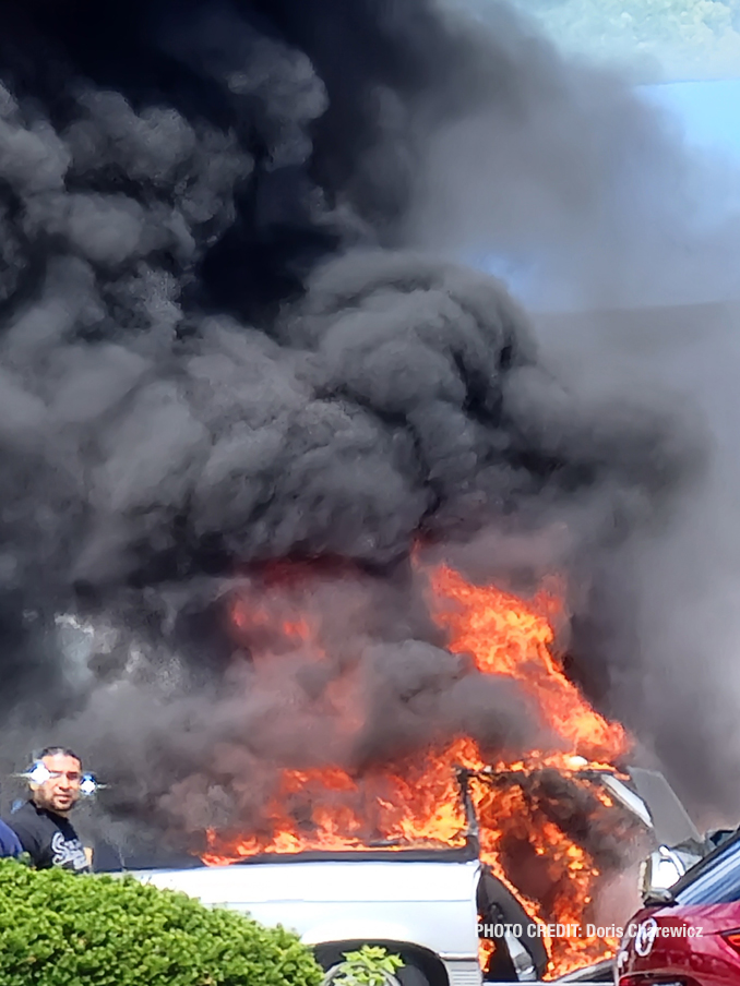 Vehicle fire scene at America's Best Car Wash in Mount Prospect on South Elmhurst Road in Mount Prospect (PHOTO CREDIT: Doris Charewicz)