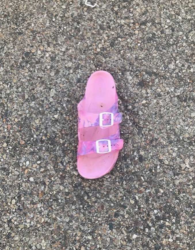 A Pink tie-dye colored rubber sandal, "Rouge" brand, size 7.5 found in the vicinity of the kidnapping in Peru, Illinois on Monday, June 14, 2021 about 5:00 a.m. (SOURCE: FBI).