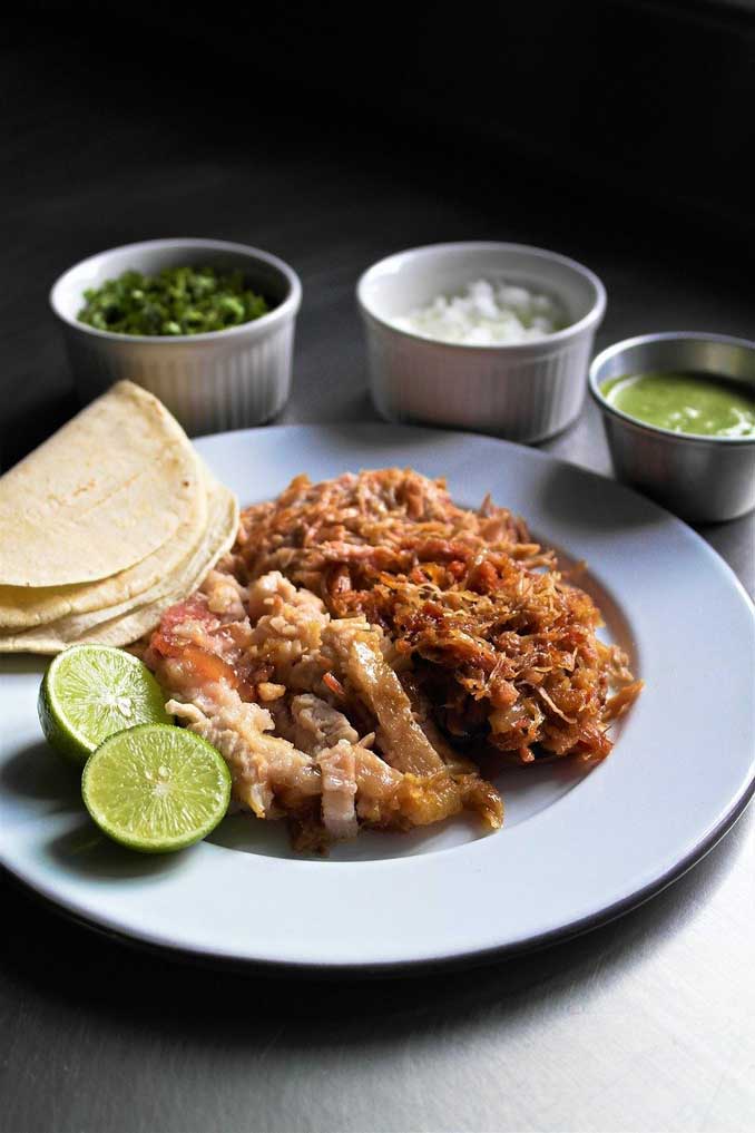 Tacos de Carnitas (Image by <a href=https://www.arlingtoncardinal.com/2021/06/popular-recipes-from-mexico-especially-for-summer-dining/