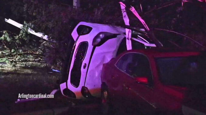 Tornado tosses Kia on side at The Estates of Thornberry Woods near the border of Naperville and Woodridge in Illinois