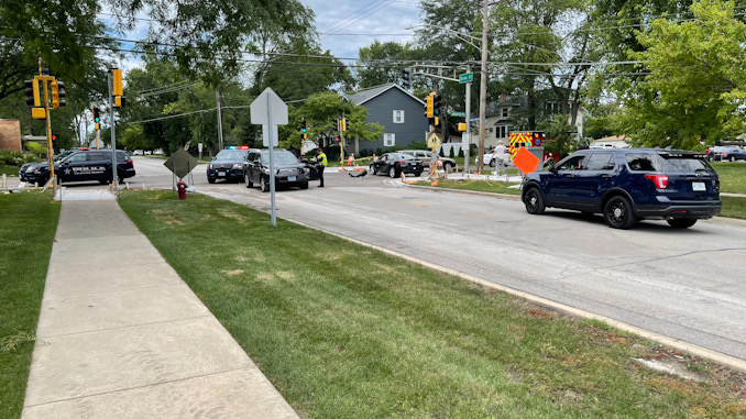 Toyota SUV (left) with left-front damage and Hyundai sedan at Arlington Heights Road and Olive Street on Friday, July 30, 2021