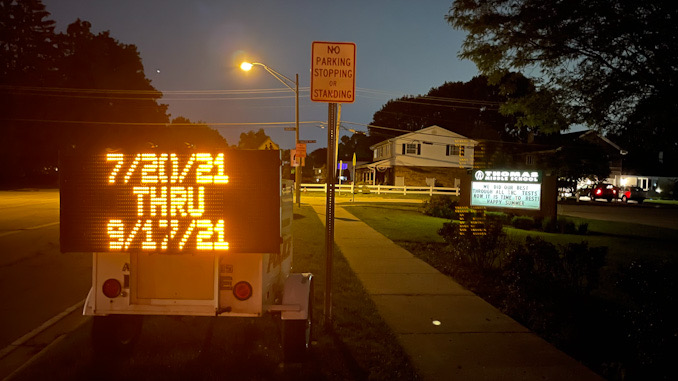 07/20/21 THRU 09/17/21 displayed at sign at Thomas Street and Belmont Avenue in Arlington Heights