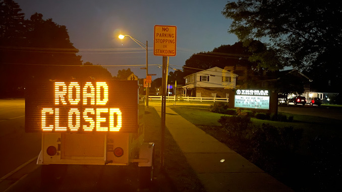 Road Closed displayed at sign at Thomas Street and Belmont Avenue in Arlington Heights