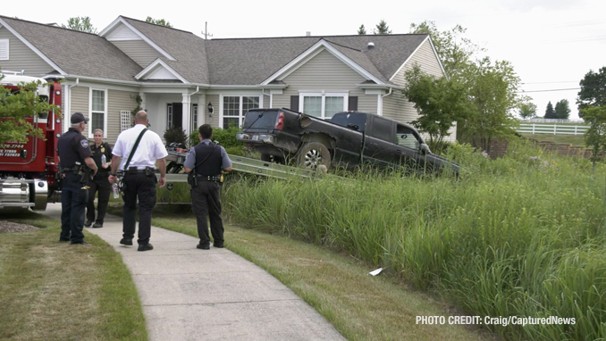 Offender's Chevrolet Silverado on a flatbed tow truck after he was captured in the Grand Dominion by Del Webb community following a pursuit that started in Wauconda (SOURCE: Craig/CapturedNews)