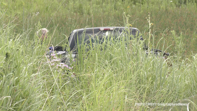 Offender's Chevrolet Silverado stranded in a backyard marsh after he was captured in the Grand Dominion by Del Webb community following a pursuit that started in Wauconda (SOURCE: Craig/CapturedNews)