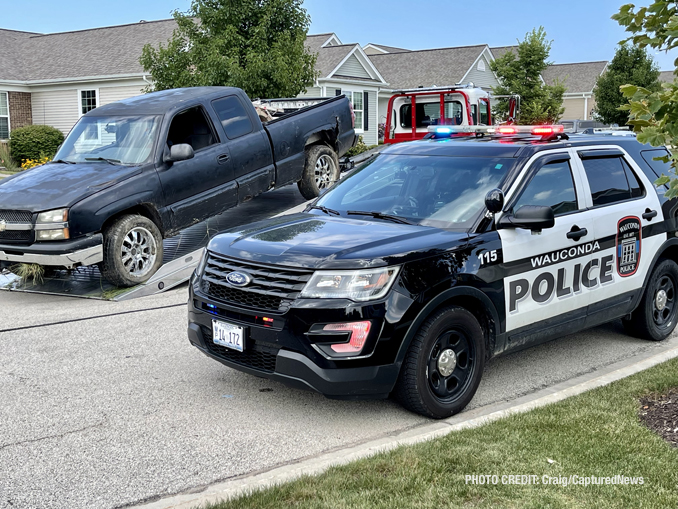 Offender's Chevrolet Silverado on a flatbed tow truck after he was captured in the Grand Dominion by Del Webb community following a pursuit that started in Wauconda (SOURCE: Craig/CapturedNews)