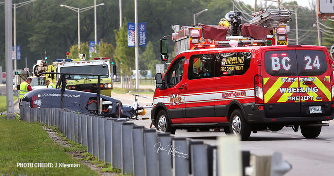 Helicopter crash scene photos close to northbound lanes of Milwaukee Avenue at Apple Drive in Prospect Heights (PHOTO CREDIT: J Kleeman)