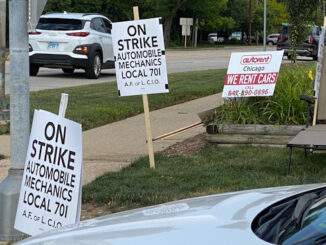 ON STRIKE Automobile Mechanics Local 701 at the southeast corner of Dundee Road and Ridge Avenue. Mechanics across Ridge Avenue at Arlington Heights Ford are not on strike