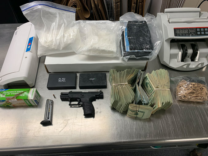 Gun, money bill counter, and scale (SOURCE: Lake County Sheriff's Office)