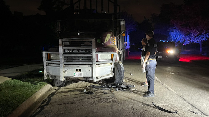 Black Toyota 4Runner crash into a Mack Truck