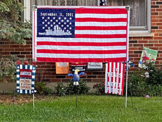 Tribute US flag for September 11, 2001 in front yard at Arlington Heights home