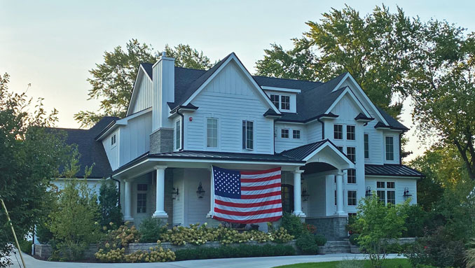 Big US flag displayed at home in Arlington Heights on September 11, 2021